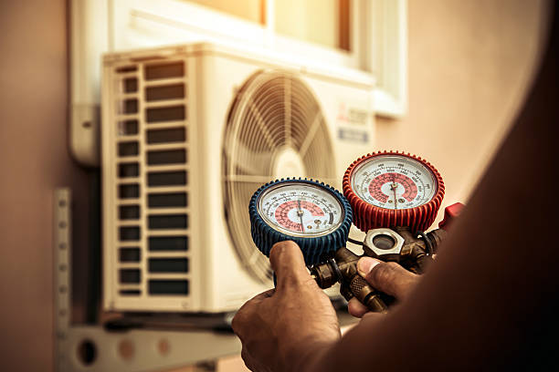 Professional Air Conditioning Service technician working in Delmar, DE
